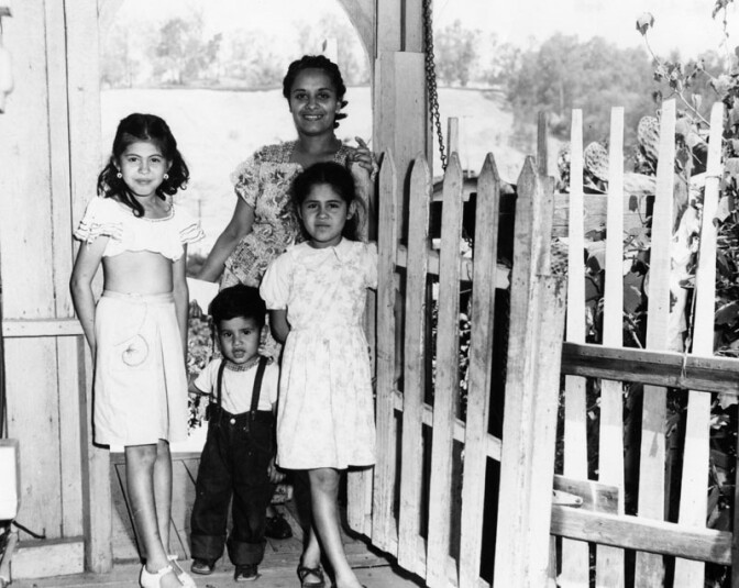 1951: "The Navarro family pose at their Chavez Ravine home before their relocation to the William Mead Homes Housing Project. Blasito Navarro (divorced) lived with her 3 children in this 5 room house, which rented for $25 per month." Courtesy of the Los Angeles Public Library