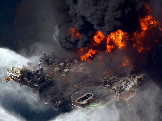 The Deepwater Horizon oil rig is seen burning in this April 21 file photo taken in the Gulf of Mexico.