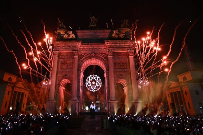  A general view of the Olympic flame in the Olympic cauldron designed by Marco Balich next to the Arco della Pace monument in Milan.