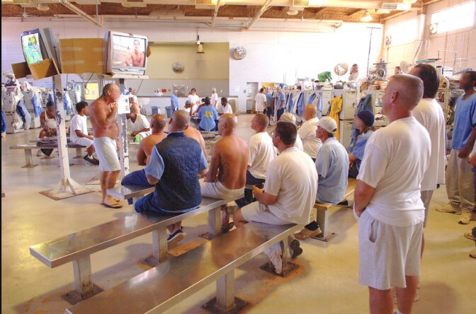 Men watch television in a recreation area at Solano Prison.