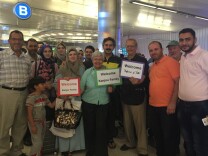 Members of the Islamic Center of Claremont and the First Presbyterian Church of Pomona, along with relatives who arrives as refugees a year ago, met the newly-arrived Kanjou family at the airport last month when the Syrian refugees arrived in Southern California.