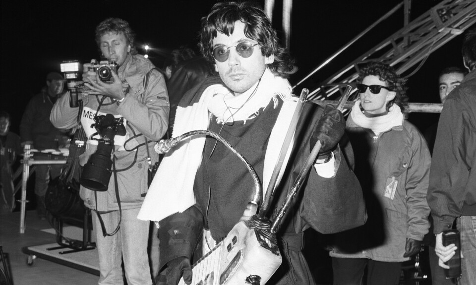 Jean Michel Jarre, musician and producer, pictured holding a musicial instrument, 12th October 1988. (Photo by Express Newspapers/Getty Images)