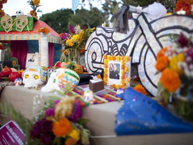 This Día de Los Muertos altar in Grand Park, titled "Seekers and Dreamers," is dedicated to Leonard Luna III and Jose Estrada.