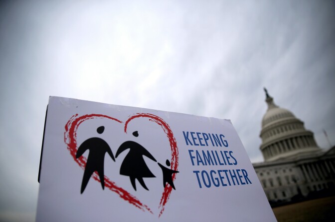 A sign is seen during a news conference on immigration reform at the east front of the U.S. Capitol March 11, 2014 on Capitol Hill in Washington, DC. The Fair Immigration Reform Movement (FIRM) held the news conference to "demand that Congress and President Obama stop the senseless family-separation crisis that is gripping the immigrant community by passing immigration reform with a path to citizenship and stopping senseless deportations."   
