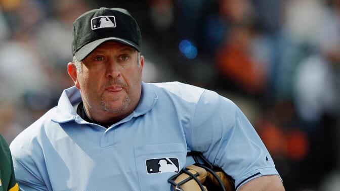 MLB umpire Dale Scott. Scott recently announced that he was gay, making him the first openly gay umpire.  (Photo by Brian Bahr/Getty Images)