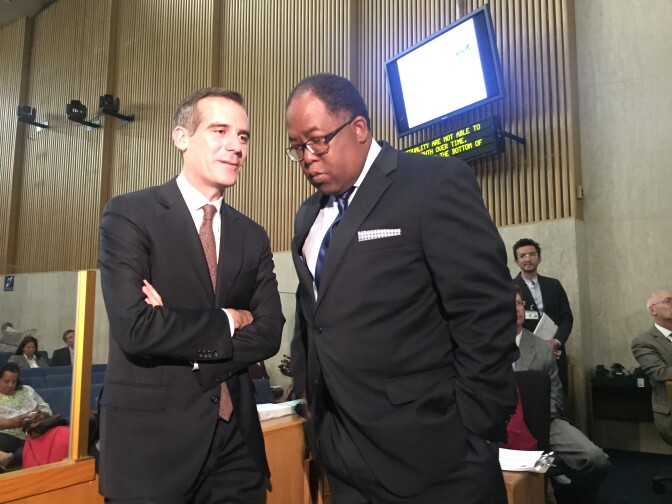 L.A. Mayor Eric Garcetti talks with L.A. County Supervisor Mark Ridley-Thomas