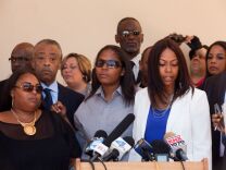 Rodney King's daughters, from left, Candice King, Tristian King and Laura Dene King remember the legacy of their father at the Lawn Forest Memorial.