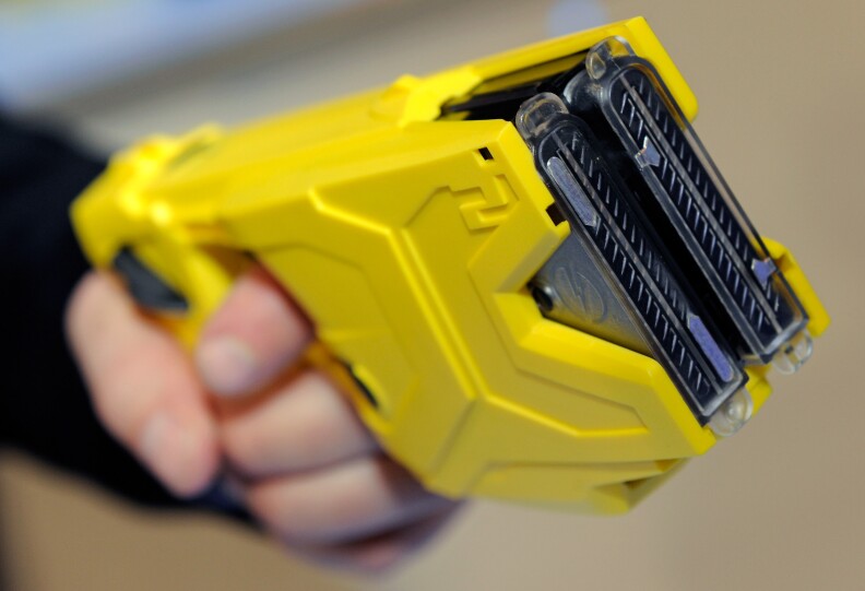 File: Taser International's X2 two-shot Taser for law enforcement is displayed at the National Shooting Sports Foundation's 34th annual Shooting, Hunting, Outdoor Trade Show at the Sands Expo and Convention Center in January 2012 in Las Vegas, Nevada.