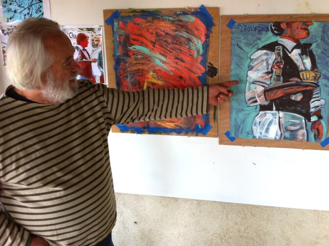 Frank Romero and his painting of a waiter at Picasso's favorite restaurant, Cafe des Fleurs. Romero works his brushes on the canvas on the left, then uses it for the base of a new painting.