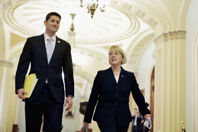 WASHINGTON, DC - DECEMBER 10:  House Budget Committee Chairman Paul Ryan (R-WI) and Senate Budget Committee Chairman Patty Murray (D-WA) walk past the Senate chamber on their way to a press conference to announce a bipartisan budget deal, the Bipartisan Budget Act of 2013, at the U.S. Capitol on December 10, 2013 in Washington, DC. The $85 billion agreement would set new spending levels for the next two years and create $63 billion in so-called 'sequester relief.'  (Photo by T.J. Kirkpatrick/Getty Images)