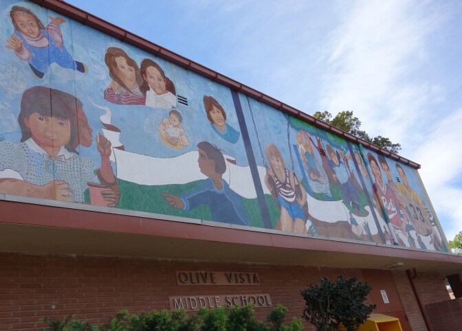 This mural decorates the street-facing wall of Olive Vista Middle School's multipurpose room, also known as Mile's Hall. The building is built of tilt-up concrete slabs, placing it among the most earthquake vulnerable buildings in the LAUSD's 13,000 inventory.