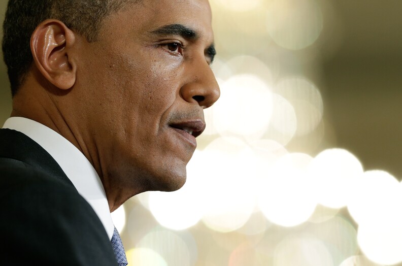 WASHINGTON, DC - AUGUST 09:  U.S. President Barack Obama answers questions during a press conference in the East Room of the White House August 9, 2013 in Washington, DC. Obama answered questions on national security issues and related matters during the press conferece.  (Photo by Win McNamee/Getty Images)