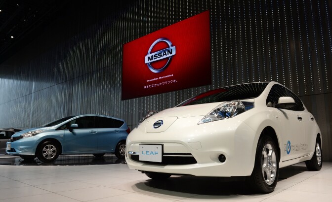 Nissan Motors' Zero Emission electric vehicle 'Leaf' (R) and five-door hatchback 'Note' are on display at the showroom of its headquarters in Yokohama, south of Tokyo on May 10, 2013. Nissan said its annual net profit came in nearly flat from a year earlier, a result that stood in stark contrast to rivals Toyota and Honda which have booked soaring profits.