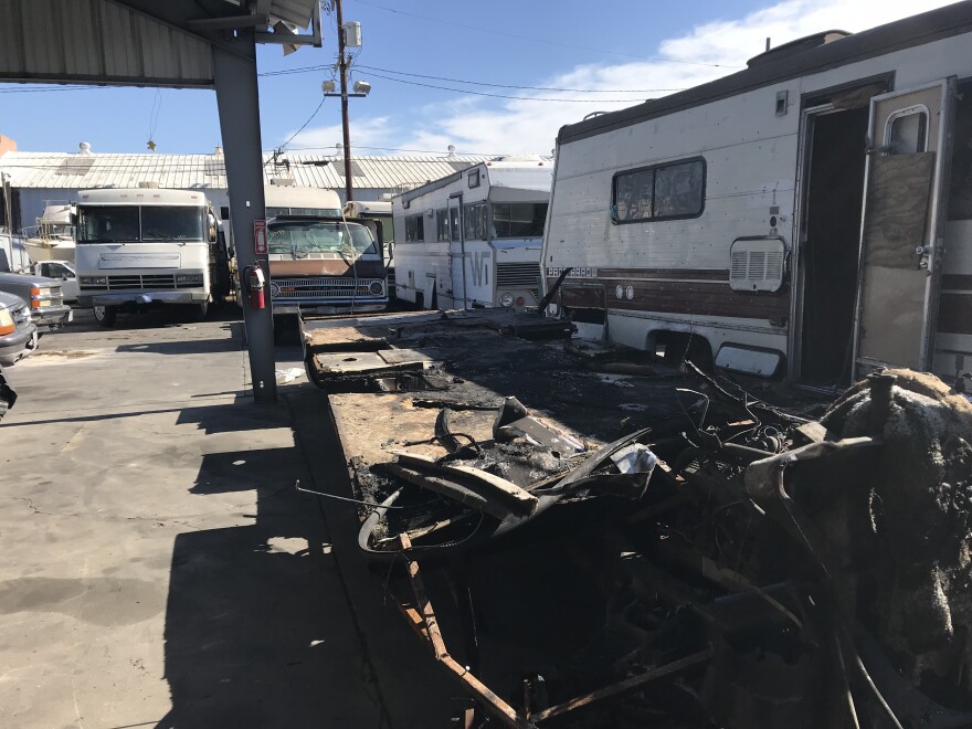 The company tows in two to three charred RV's each month, like this one from the San Fernando Valley.