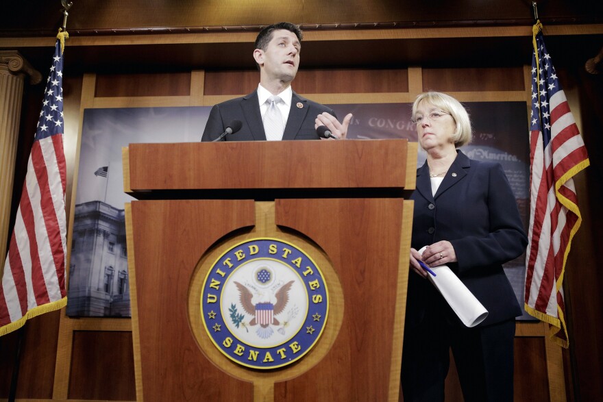 House Budget Committee Chairman Paul Ryan (R-WI) speaks at a press conference to announce a bipartisan budget deal, the Bipartisan Budget Act of 2013, as Senate Budget Committee Chairman Patty Murray (D-WA) looks on at the U.S. Capitol on December 10, 2013 in Washington, DC. The $85 billion agreement would set new spending levels for the next two years and create $63 billion in so-called 'sequester relief.' 