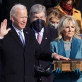 WASHINGTON, DC - JANUARY 20: Joe Biden is sworn in as U.S. President as his wife Dr. Jill Biden looks on during his inauguration on the West Front of the U.S. Capitol on January 20, 2021 in Washington, DC.  During today's inauguration ceremony Joe Biden becomes the 46th president of the United States. (Photo by Alex Wong/Getty Images)