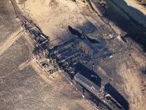 Overhead photos show the leaking Aliso Canyon well pad near the Porter Ranch community on Dec. 17, 2015.
