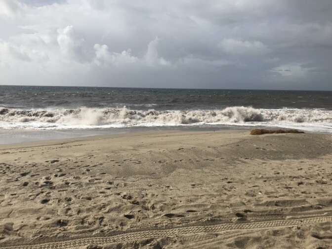 Brown water is visible in the water at Zuma Beach in Malibu after the region was pelted with rain. 