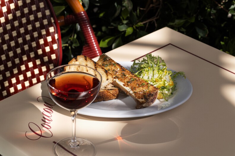Bone marrow on a dish side with wine