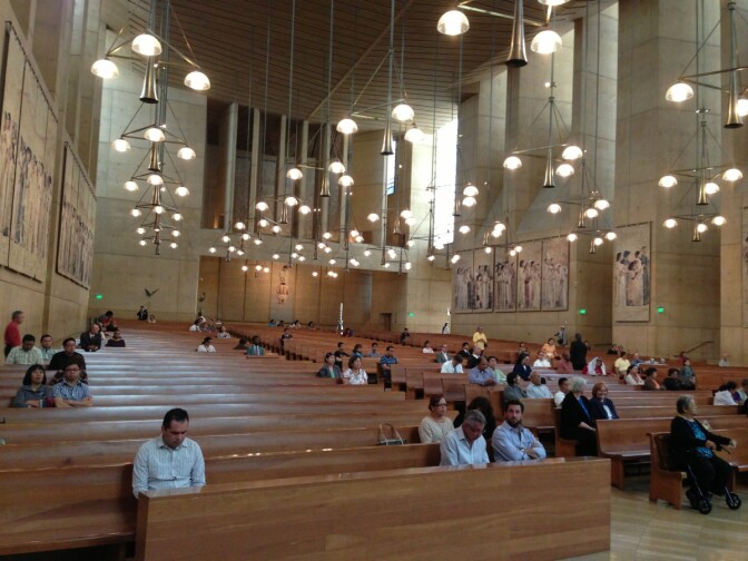 At the Cathedral of Our Lady of the Angels in downtown L.A. Wednesday, March 13, 2013, awaiting a midday service following the announcement of a new pope.