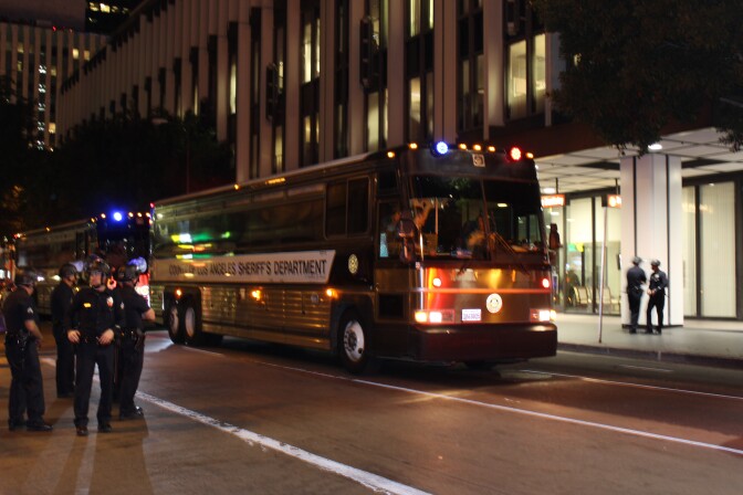 LA Sheriff's Department bus at site of arrests Wednesday, November 26.
