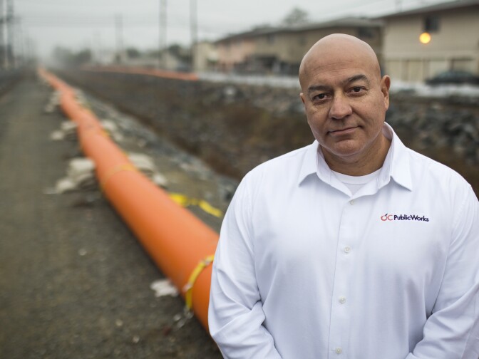 AJ Jaime, operations manager with Orange County Public Works, stands at Carbon Creek Channel near Chippewa Avenue in Anaheim on Thursday, Dec. 10, 2015. Water from this channel makes its way into Coyote Creek.