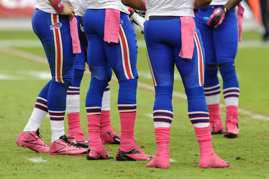 Members of the Buffalo Bills wear pink during a game against the Arizona Cardinals for Breast Cancer Awareness Month.