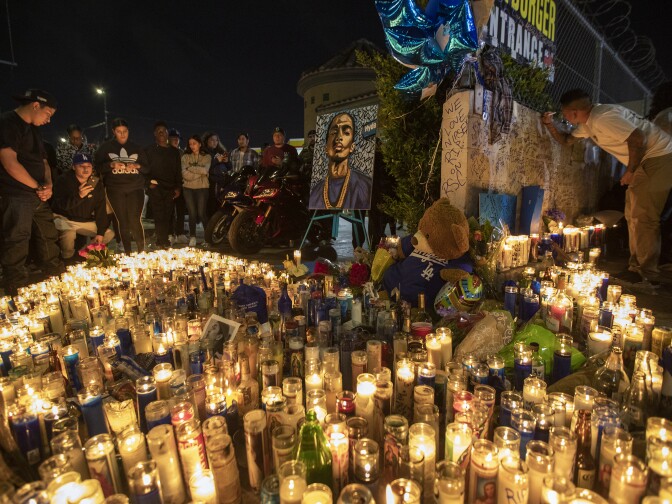 LOS ANGELES, CA - APRIL 01: People mourn for rapper Nipsey Hussle on April 1, 2019 in Los Angeles, California. The Grammy-nominated artist was gunned down in broad daylight in front of The Marathon Clothing store he founded in 2017 on the day he was scheduled to meet with Los Angeles Police Department brass to discuss ways of stopping gang violence.   (Photo by David McNew/Getty Image)