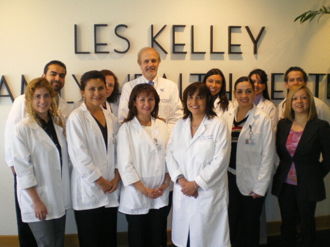 Dr. Blanca Campos (3rd from L, 1st row) standing with Executive Director Dr. Michelle Bholat (3rd from R, 1st row), former program coordinator Ana Jimenez (1st row R), Associate Director Patrick T. Dowling (3rd from L, 2nd row) and Blanca's graduating class of UCLA IMG colleagues in their program's headquarters.