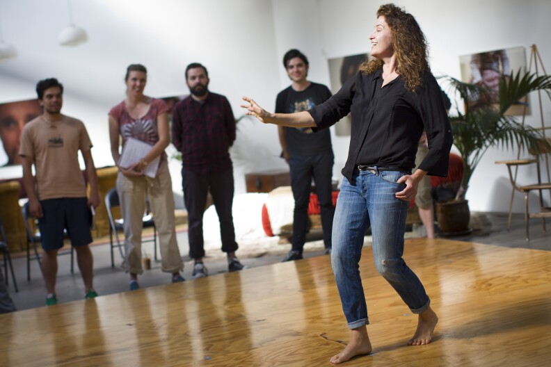 Joan Scheckel tangoes as part of a beat exercise during the final day of her three-day filmmaking lab inside her Hollywood studio on Sunday, May 3, 2015.