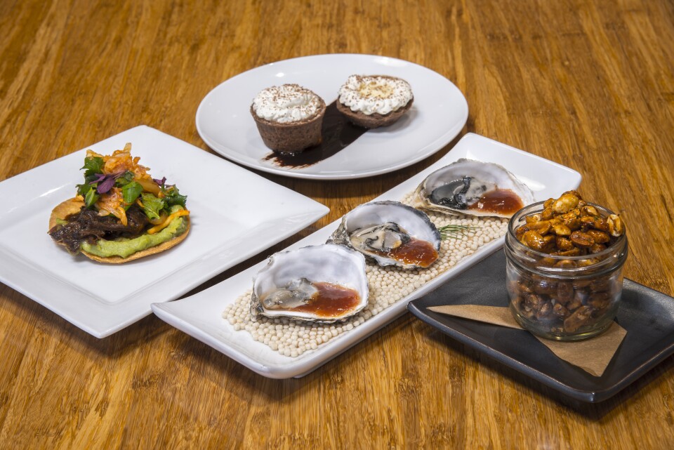 BBQ Korean short rib tostada with Kimchi, herbs and avocado salsa, honey roasted peanuts with Togarashi, Banana and Chocolate creampie and Oyster Cocktails.