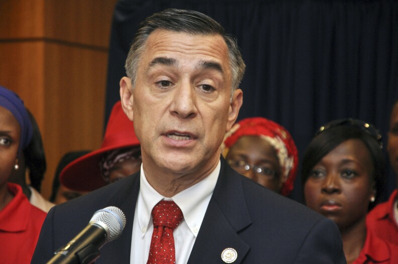 FILE - In this Aug. 4, 2015 file photo, U.S. Rep. Darrell Issa, R-Calif., speaks at a news conference at the U.S embassy in Abuja, Nigeria. Issa joined the other 13 Republicans from California's congressional delegation in voting for the GOP's health care bill. Seven of the Republicans represent districts that supported Hillary Clinton in the presidential election and will be especially vulnerable if the bill sparks a backlash from moderate voters. (AP Photo/Olamikan Gbemiga, File)