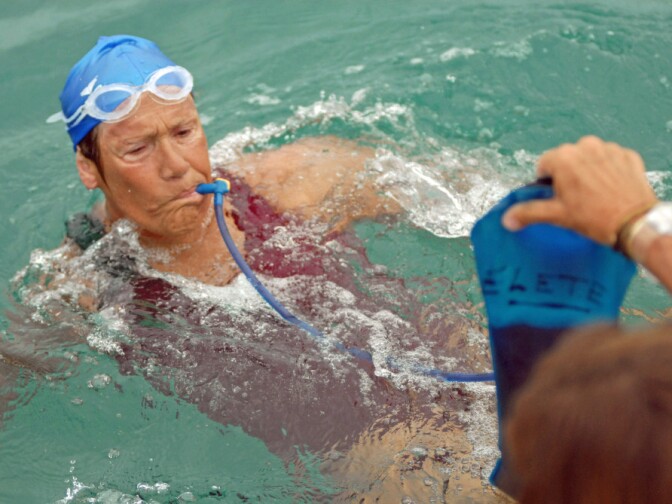 Nyad stops for hydration and feeding breaks every hour and a half. Her team estimates she will take 40 breaks of five minutes each during the swim.  Here, she takes in a concoction of electrolytes and fluids. Each break will increase her time in the water and make it more difficult for boat drivers and navigators to maintain a strict course while fighting currents.