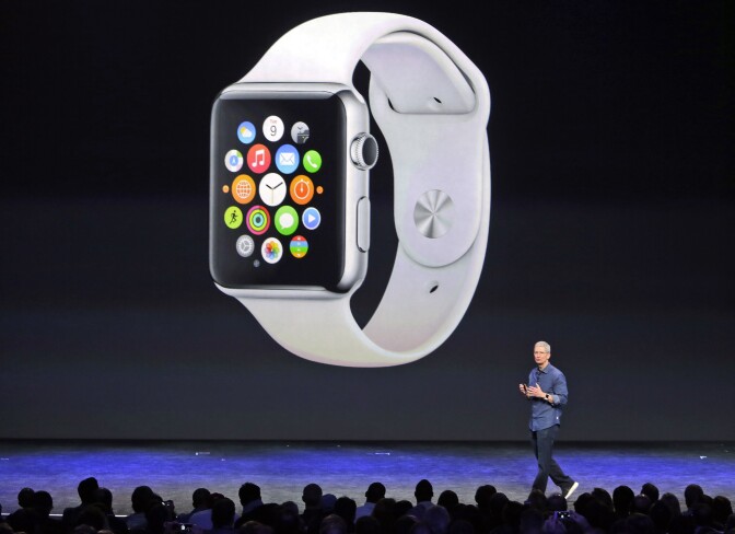 Apple CEO Tim Cook introduces the new Apple Watch on Tuesday, Sept. 9, 2014, in Cupertino, Calif. (AP Photo/Marcio Jose Sanchez)