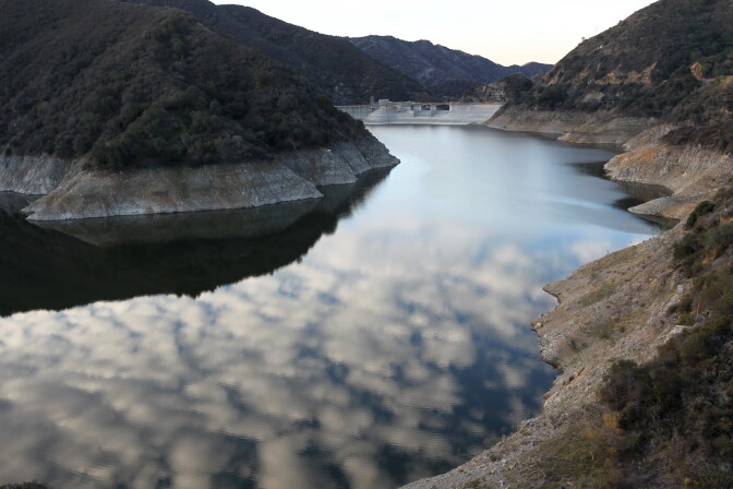 AZUSA, CA - JANUARY 22:  Rocky shores are exposed by the low waters of Morris Reservoir on the San Gabriel River in the Angeles National Forest on January 22, 2014 in near Azusa, California. Now in its third straight year of drought conditions, California is experiencing its driest year on record, dating back 119 years, and reservoirs throughout the state have low water levels. Unseasonable dangerous wildfire weather helped spread the nearby 1,952-acre Colby Fire which firefighters are about to contain but not before it destroyed five homes, damaged 17 others and injured six people. Gov. Jerry Brown officially declared a drought emergency on Friday to speed up assistance to local governments, streamline water transfers and potentially ease environmental protection requirements for dam releases.  (Photo by David McNew/Getty Images)
