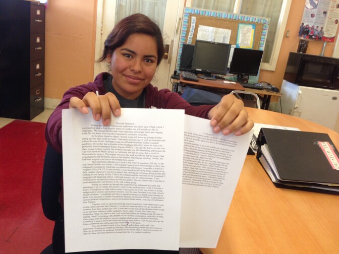 Foshay Learning Center 12th grader Jocelyn Sandoval shows off the personal statement that helped her gain admission to UCLA.