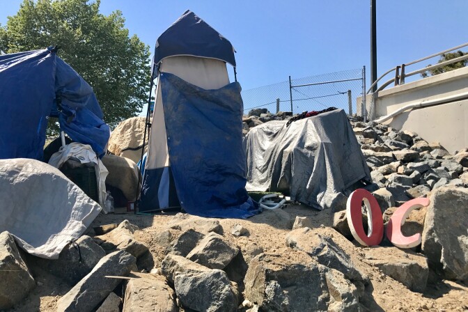 A homeless encampment near the Santa Ana River, April 21, 2017. According to a January 2019 tally, 6,860 people sleep outside or in shelters in Orange County.  