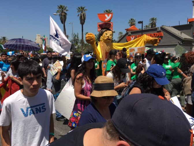 Marchers start moving downtown during Monday's May Day gathering in Los Angeles.