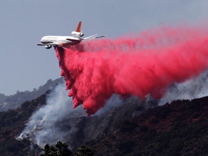 A DC-10 air tanker drops fire retardant in Duarte on Wednesday, June 22, 2016. Twin fires have continued to burn in the San Gabriel Valley.