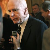 U.S. Sen. John McCain (R-AZ) speaks to members of the media as he arrives for the weekly Senate Republican Policy Committee luncheon September 24, 2013 on Capitol Hill in Washington, DC. Senate Republicans held the luncheon to discuss Senate Republican agendas. 