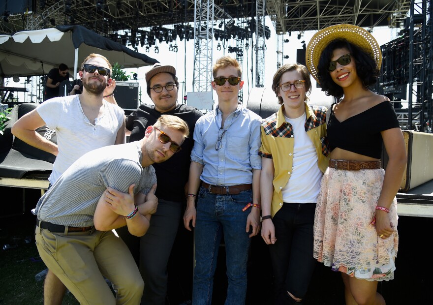 (L-R) Musicians Matthew Holmen, Zach Johnston, Matteo Roberts, Davey Roberts, Jason Krunnfusz and Monica Martin of the band PHOX pose backstage during day 2 of the 2015 Coachella Valley Music & Arts Festival (Weekend 1) at the Empire Polo Club on April 11, 2015 in Indio, California.