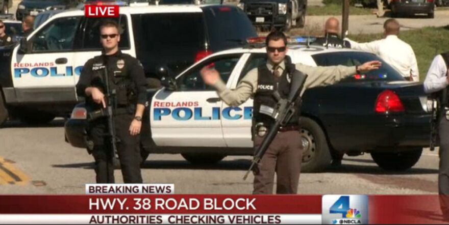This is a screen shot from NBC LA as police man a road block on state Route 38 in the Big Bear area on Feb. 12, 2013. Police engaged in a gun battle with a man they believe is Christopher Dorner, wanted for murder and attempted murder.