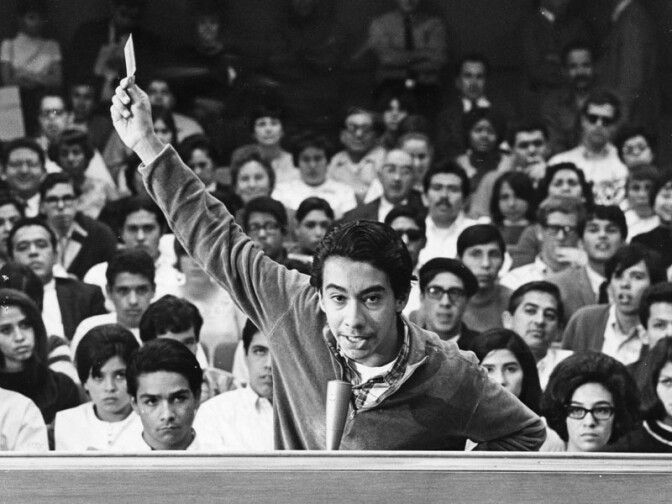 Wilson High School student Peter Rodriguez speaks during a meeting of the L.A. Unified School Board on March 12, 1968. During his speech, he waved his intact draft card to prove his participation in a student protest was not communist-inspired.