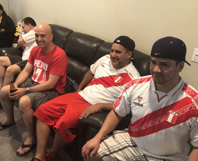 Take Two staffer, Lori Galarreta's household watches the Peru vs. Denmark game.