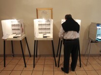 LOS ANGELES, CA - MAY 21:  A man marks his ballot in an election that is expected to have very low voter turnout for the race between Los Angeles City Controller Wendy Greuel and Councilman Eric Garcetti for Los Angeles mayor on May 21, 2013 in Los Angeles, California. Greuel could become the first-ever woman mayor of Los Angeles in her bid to replace two-time mayor Antonio Villaraigosa.  (Photo by David McNew/Getty Images)