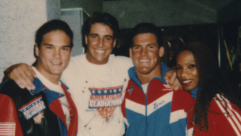 Vintage photo of 4 people embracing one another.
