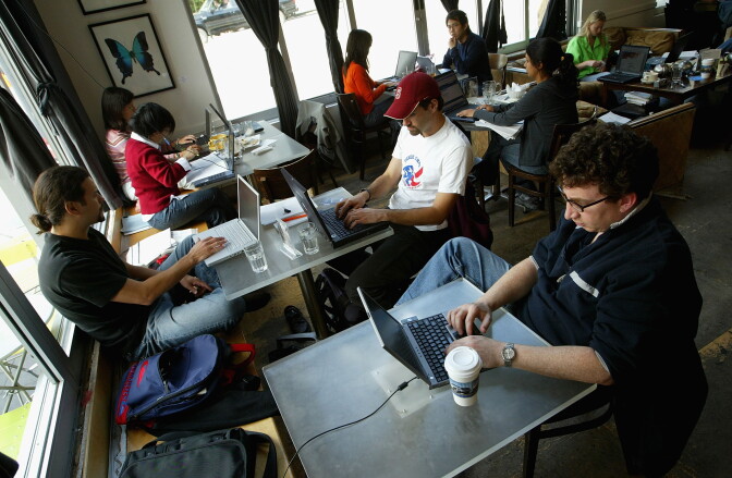 Customers at the Canvas Cafe take advantage of free wireless 'wi-fi' internet access in San Francisco.