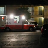 DALLAS, TX - OCTOBER 02: Volunteers from the Red Cross deliver blankets and other supplies to a unit at the Ivy Apartments, where the confirmed Ebola virus patient was staying, on October 2, 2014 in Dallas, Texas. The first confirmed Ebola virus patient in the United States was staying with family members at The Ivy Apartment complex before being treated at Texas Health Presbyterian Hospital Dallas. State and local officials are working with federal officials to monitor other individuals that had contact with the confirmed patient. (Photo by Tom Pennington/Getty Images)
