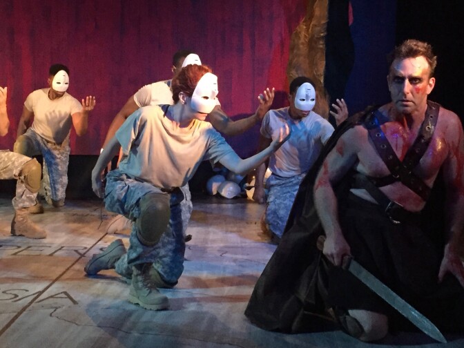 Ajax descends into madness while the Chorus behind him pleads with him to not kill himself.
