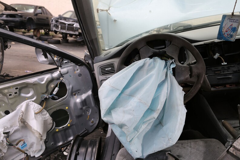 MEDLEY, FL - MAY 22:  A deployed airbag is seen in a 2001 Honda Accord at the LKQ Pick Your Part salvage yard on May 22, 2015 in Medley, Florida. The largest automotive recall in history centers around the defective Takata Corp. air bags that are found in millions of vehicles that are manufactured by BMW, Chrysler, Daimler Trucks, Ford, General Motors, Honda, Mazda, Mitsubishi, Nissan, Subaru and Toyota.  (Photo by Joe Raedle/Getty Images)